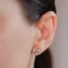 Load image into Gallery viewer, Silver Trinity Knot Earrings Encrusted With White Crystal
